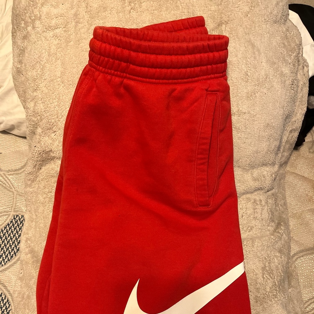 Red Nike shorts